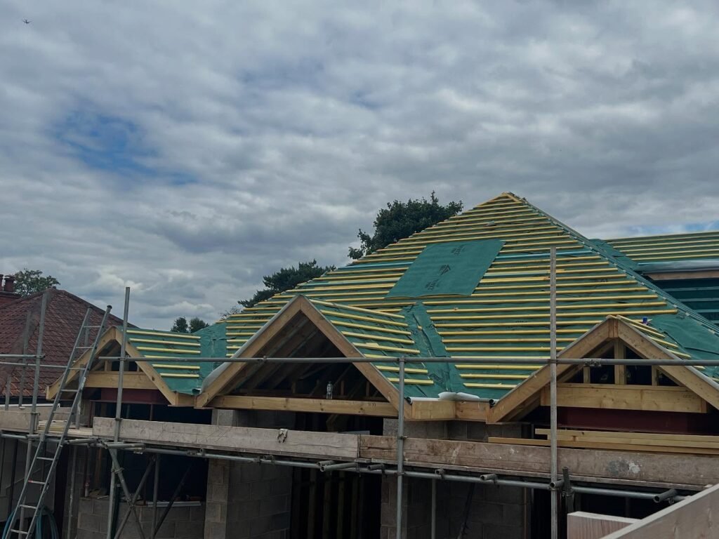 New roof installation in progress with battens and breathable membrane fitted on a residential property