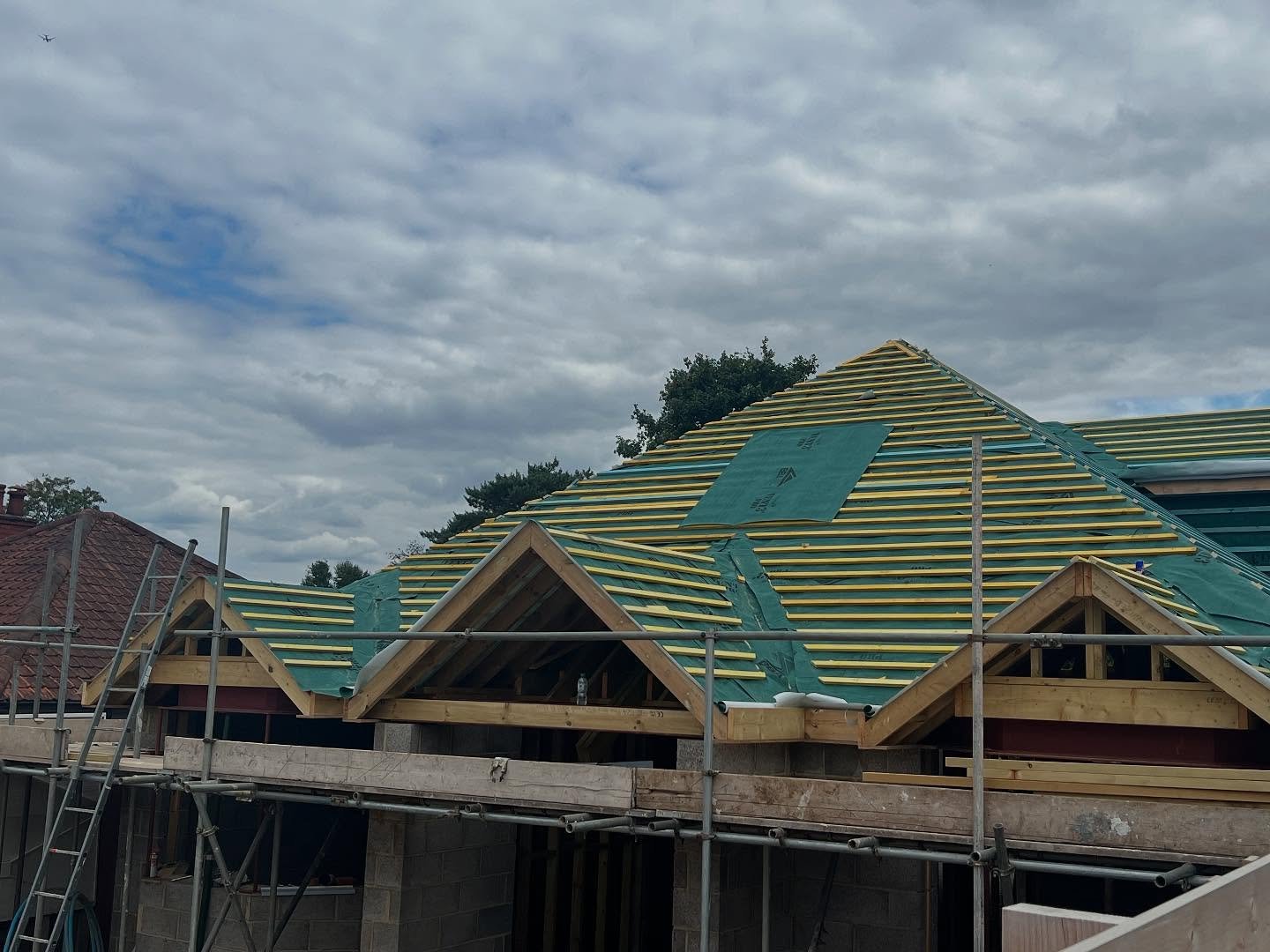 New roof installation in progress with battens and breathable membrane fitted on a residential property